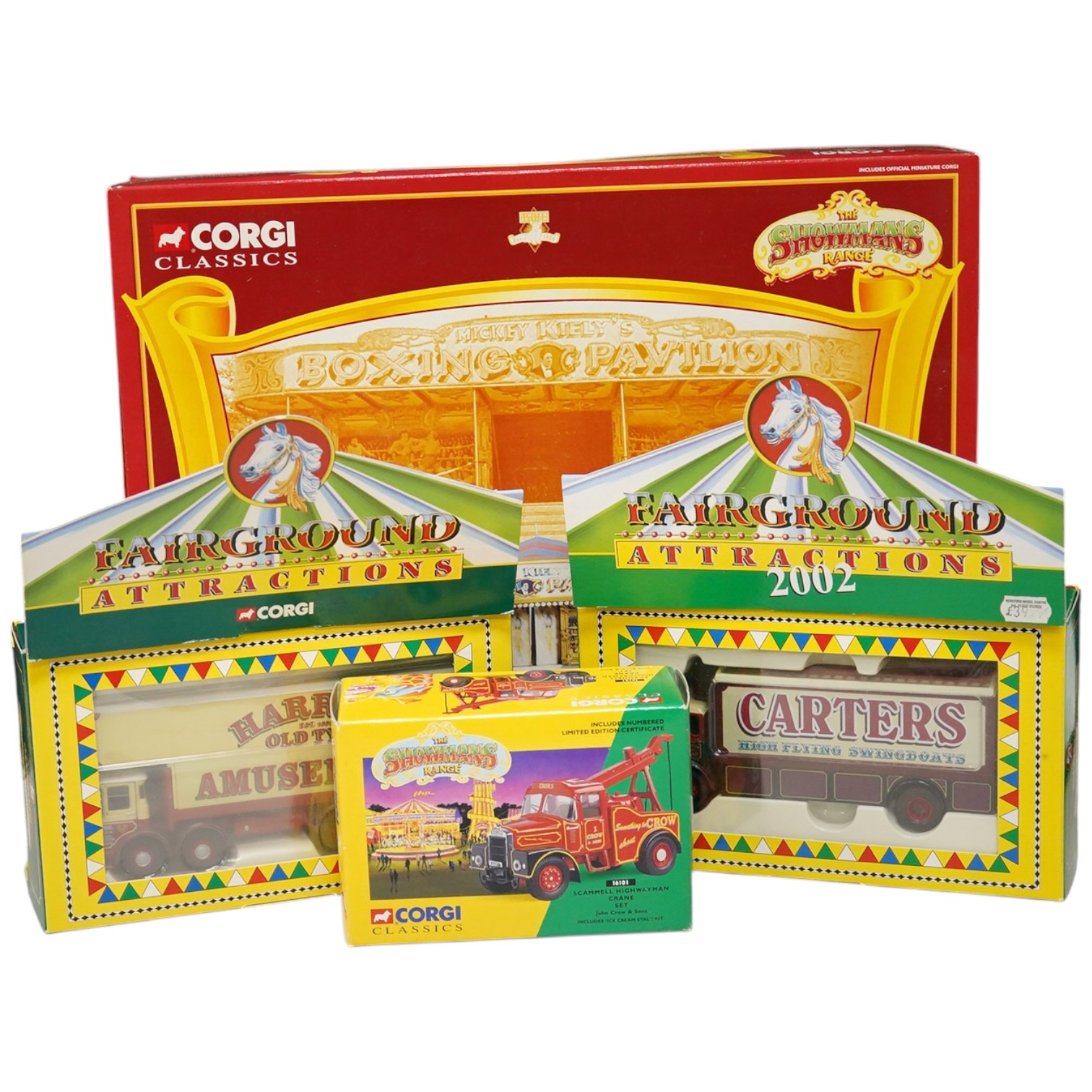 Sixteen boxed Corgi fairground related sets from series including; Fairground Attractions, Corgi Classics, Vintage Glory of Steam, etc. models include; a Mickey Kiely Boxing Set (31012), a Garrett showman’s tractor (8030